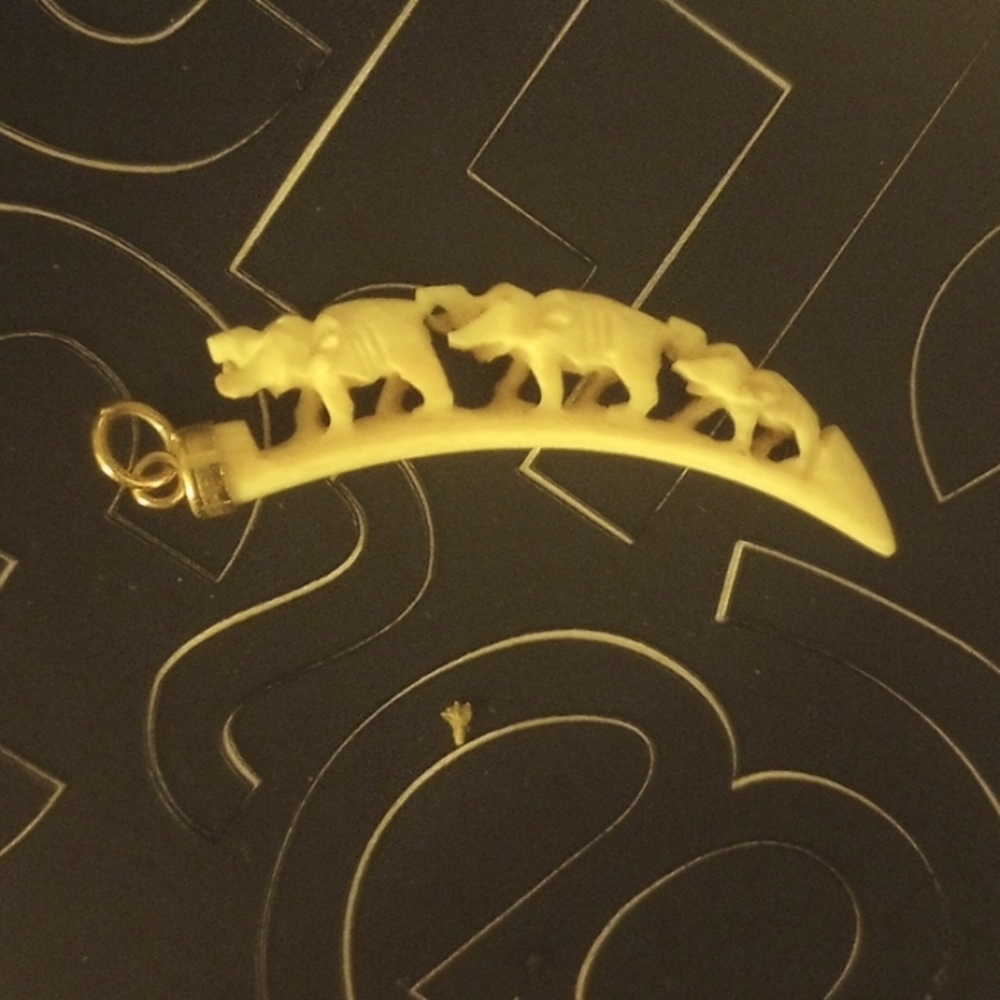 Elephant pendant ivory